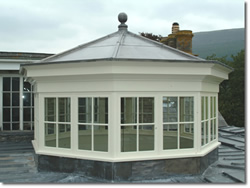 Construction of a new cupola on top of an old country mansion